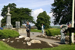 The Memorial beds are weeded again!